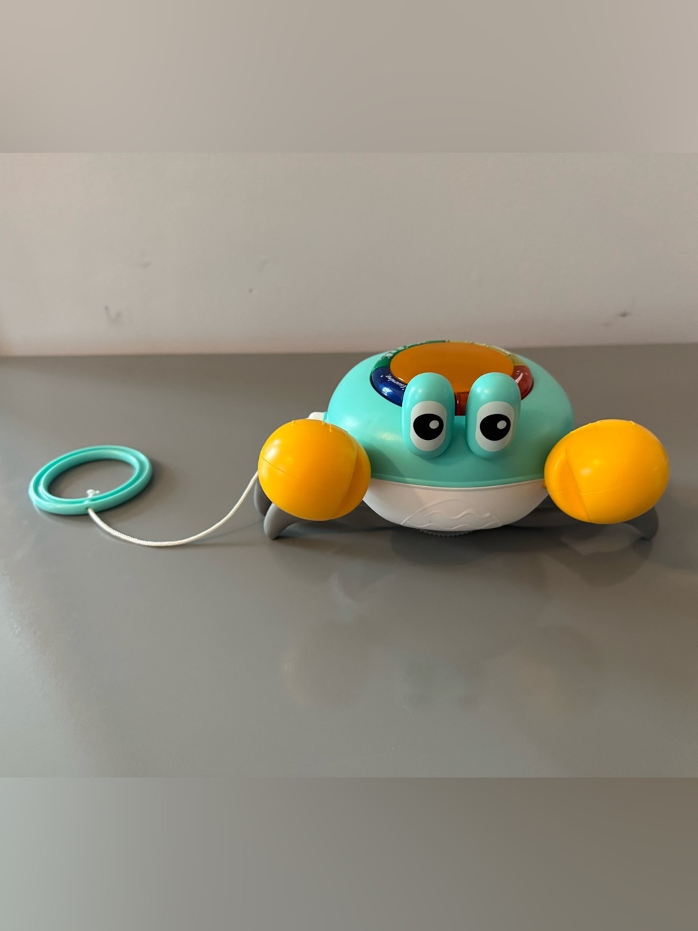 Pull-Along Crab Toy in Aqua and Yellow for Babies Learning to Crawl